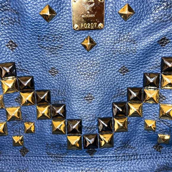 AUTHENTIC blue MCM Stark backpack with studs